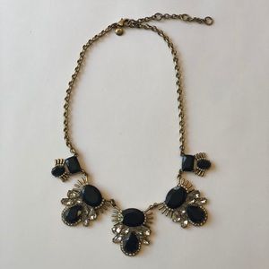 Navy, crystal, and brass colored necklace